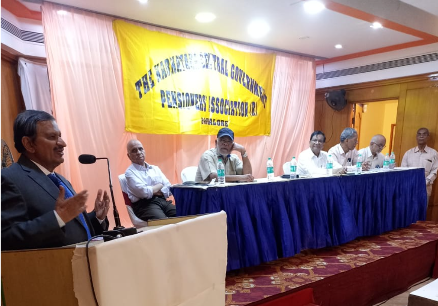 Speaker addressing members at an Association meeting